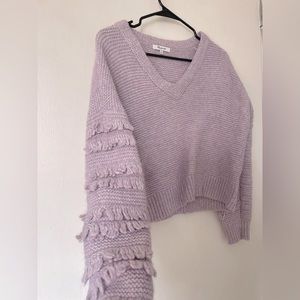 Purple sweater with ruffled sleeves